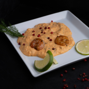 Scampis in Hummersauce und Kräuterreis